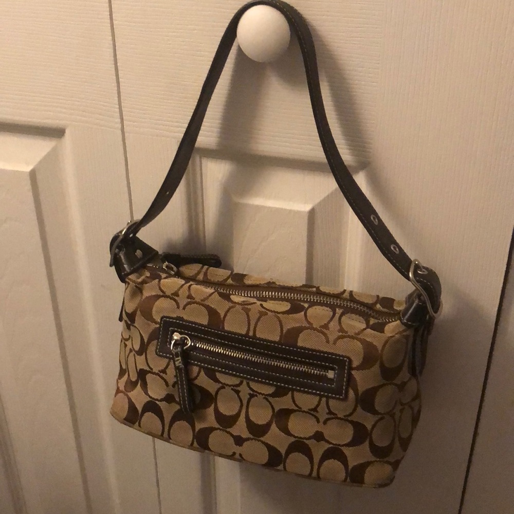 Coach purse.  Logo “C” Chocolate and Tan